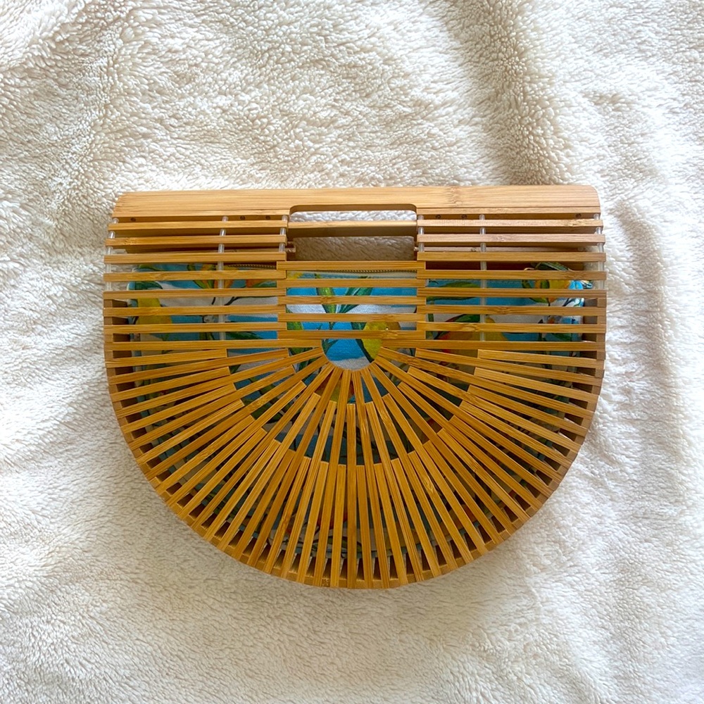 new clutch/purse. wood, lightweight and has a removable insert.
